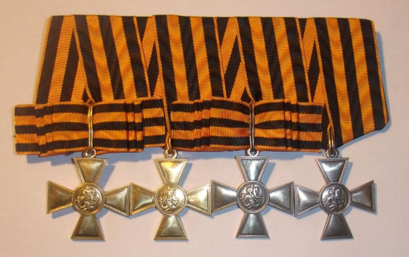 Наиболее почитаемые награды российского казачества: Георгиевский крест (знак отличия Военного Ордена) 